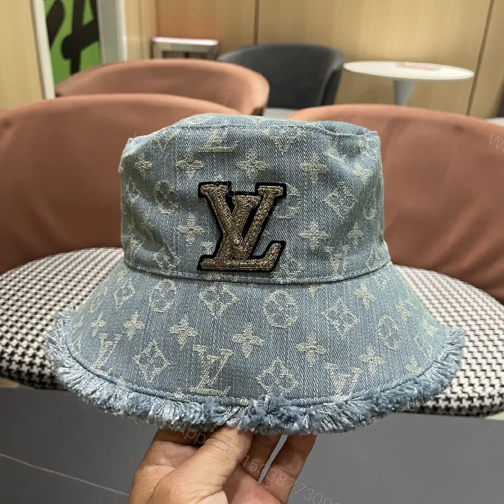 View 2 of Denim Bucket Hat with Monogram Detail – Casual Luxury & Comfort