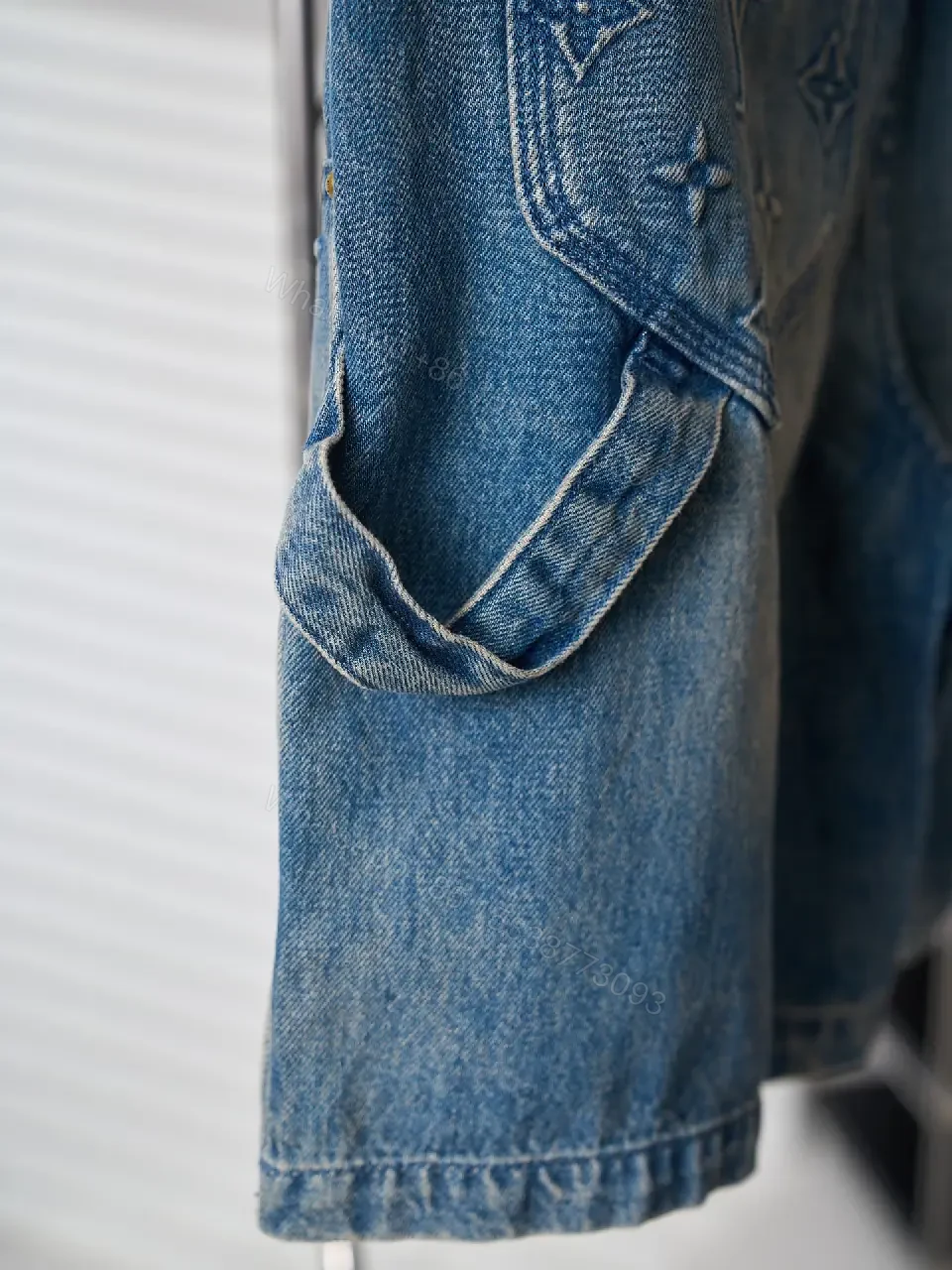 View 4 of Blue Denim Louis Vuitton Monogram Shorts