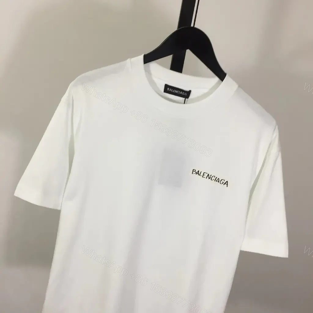 View 7 of Minimalist White Tee with Luxe Subtle Logo – Modern Essential T-Shirt