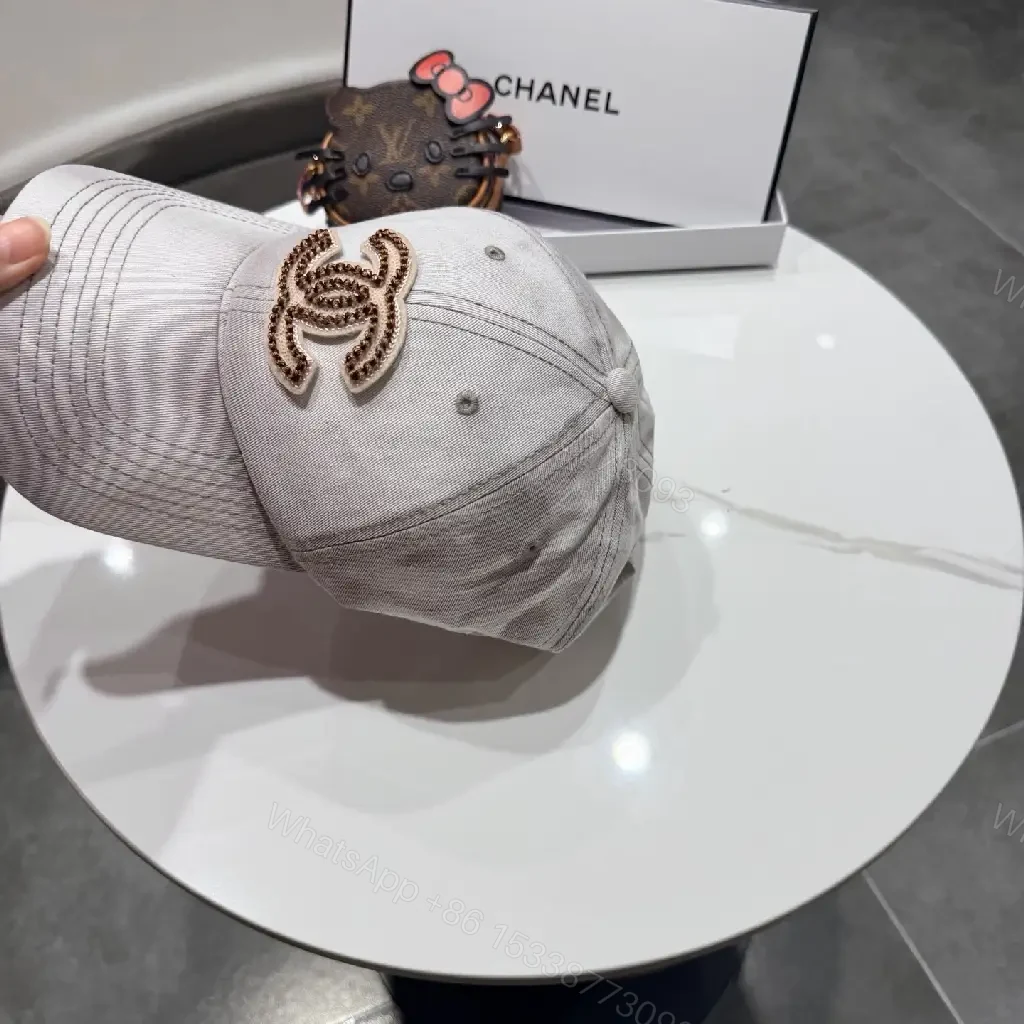 View 10 of Casual Luxe Cap: Subtle Denim, Interlock Emblem, Adjustable Strap