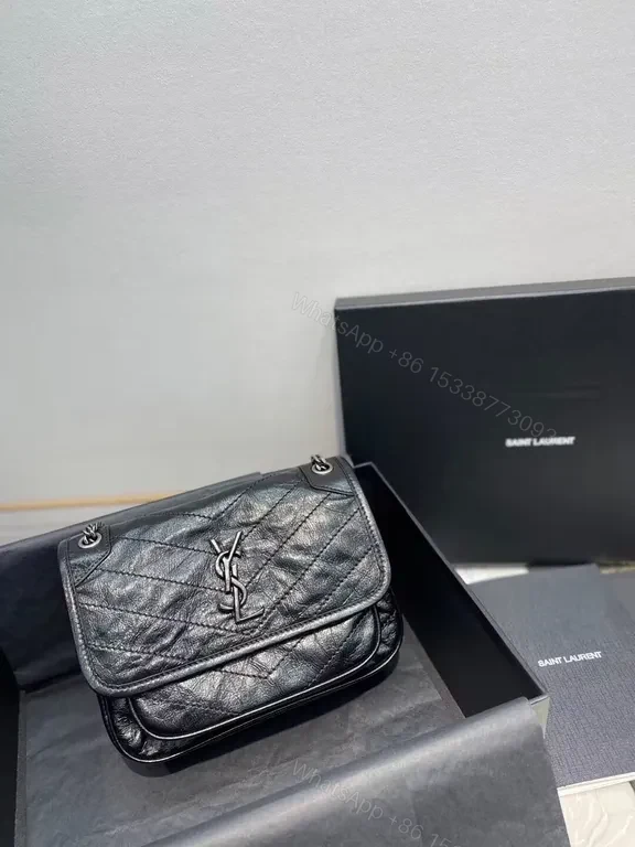 Chic Quilted Leather Crossbody Bag with YSL Hardware — view 1