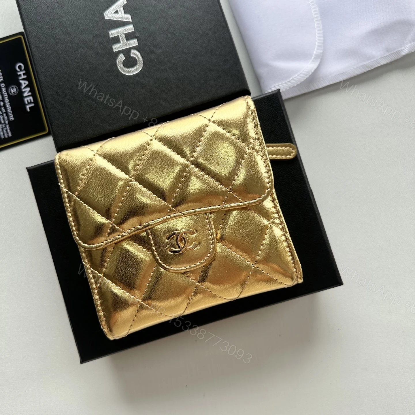 Chanel 高仿女士短夾 金色亮面設計 菱格紋限量感單品 — view 1