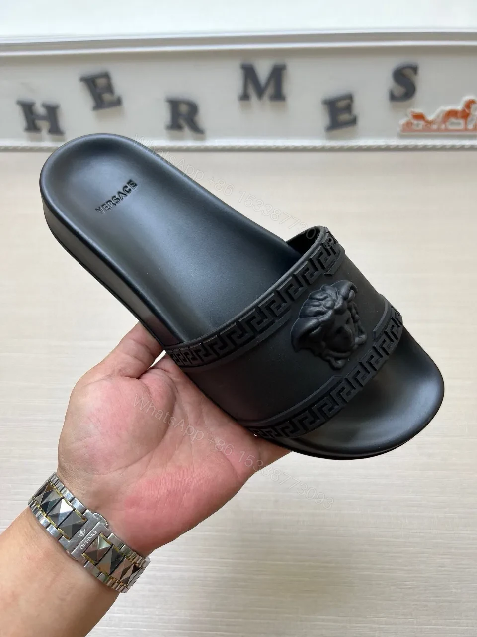 Monochrome Minimalist Slide with Luxe Detailing — view 1