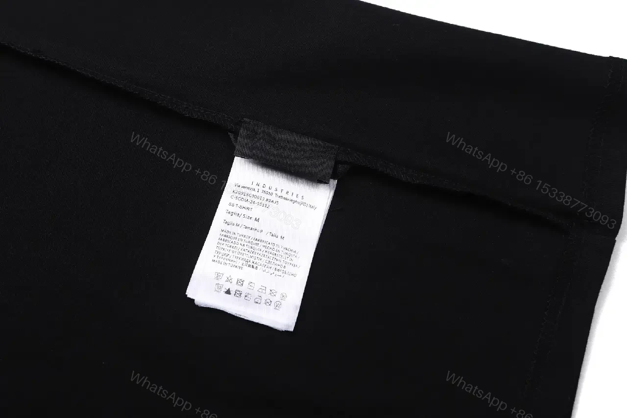 View 5 of Black Cotton Tee with Crest – Subtle Luxe Streetwear Top