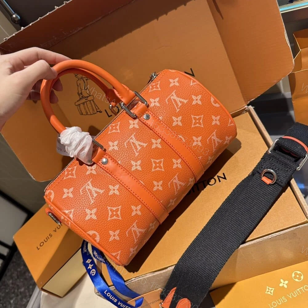 View 4 of Louis Vuitton Keepall Bandoulière 25 Tangerine 25Cm M31044