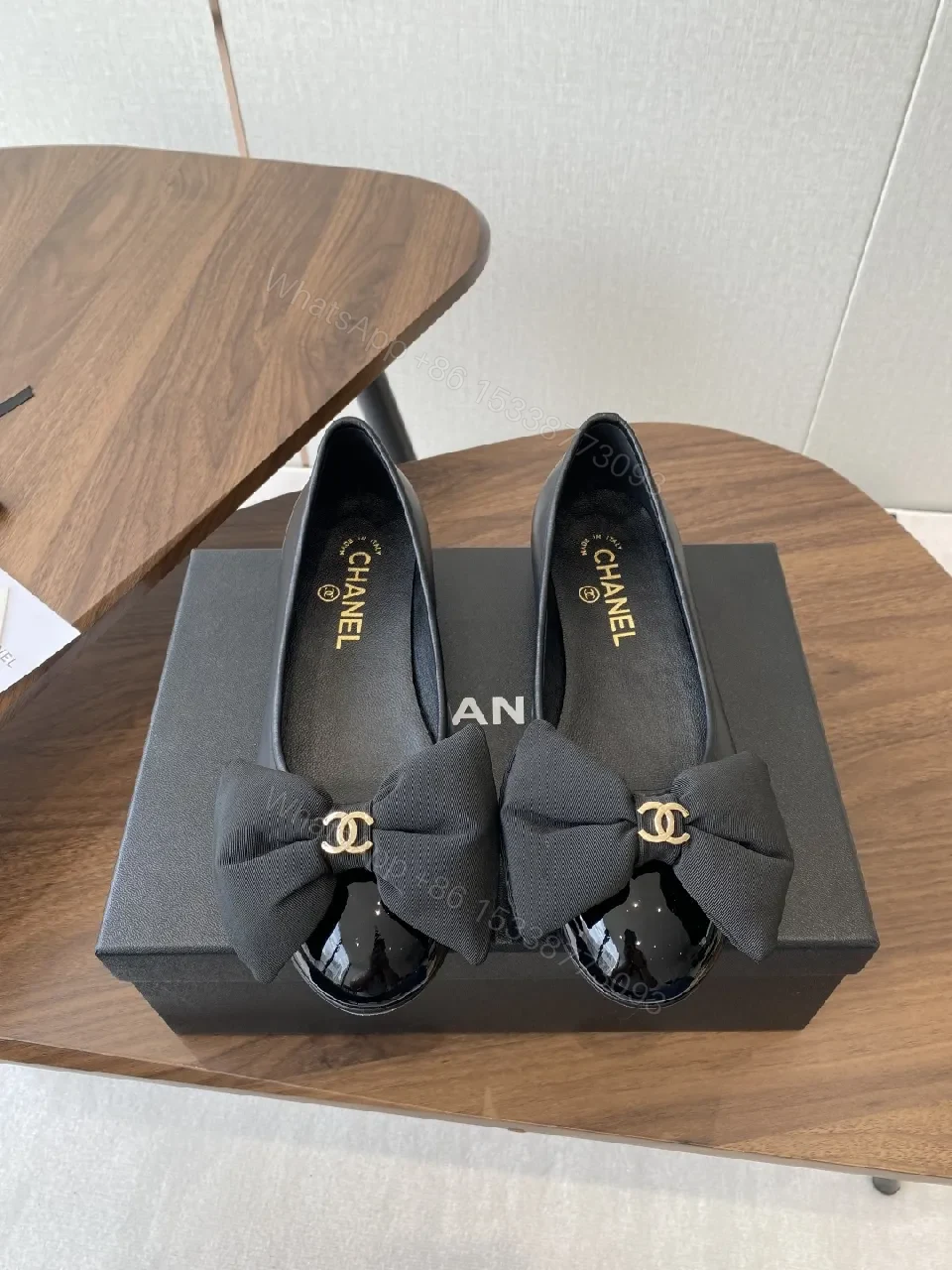 View 4 of Lux Black Leather Bow Flats with Gold Hardware
