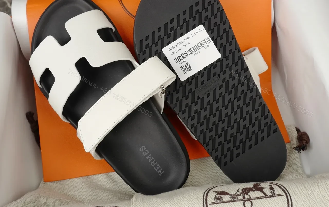 View 3 of Minimalist White Leather Sandals with Black Footbed and Hermes-Inspired Hardware