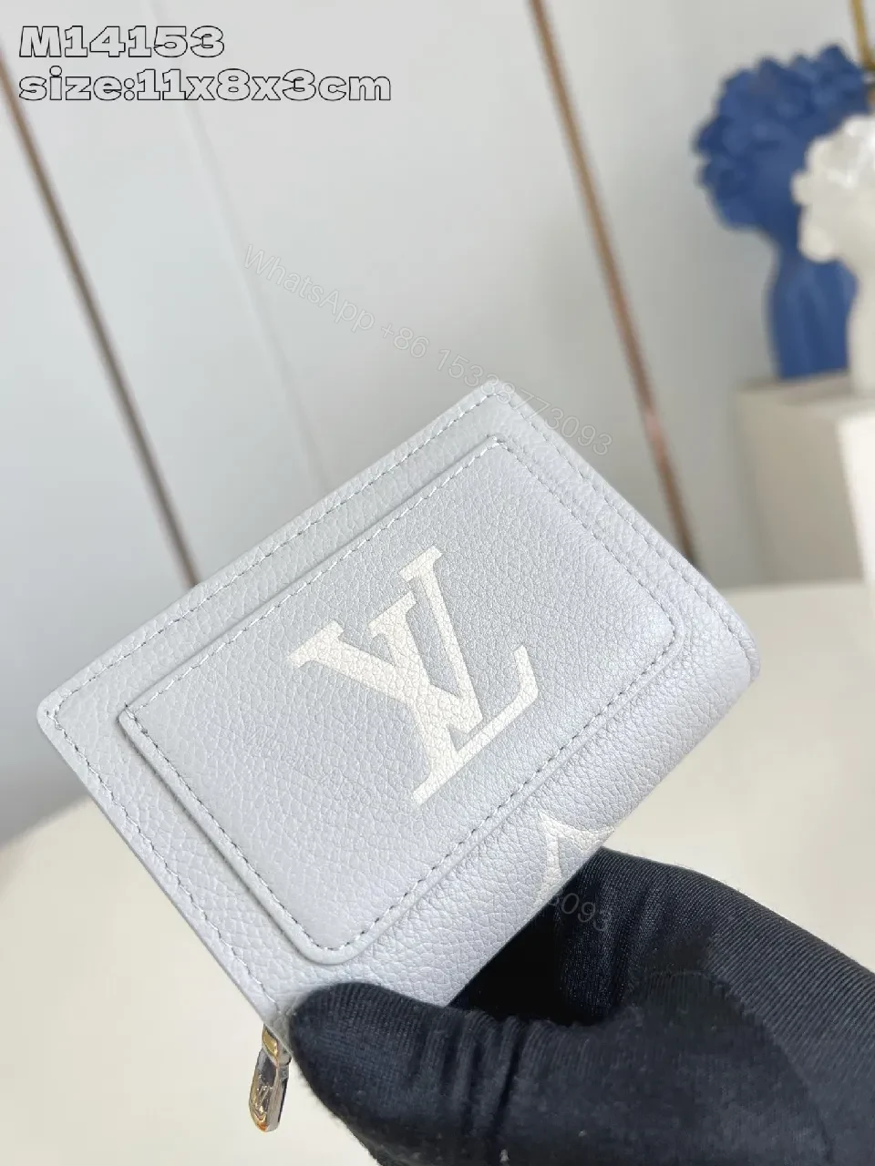 Textured Leather Compact Wallet: Monogram Accent, Secure Zip, Minimal Luxury — view 1