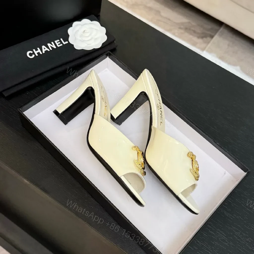 View 8 of White Patent Mules with Gold Logo Embellishment – Sleek Luxury Footwear