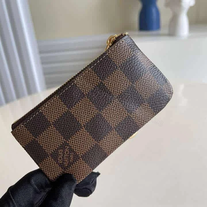 View 4 of M62650 Louis Vuitton Key Pouch Damier Ebene Coated Canvas In Brown – RRG055