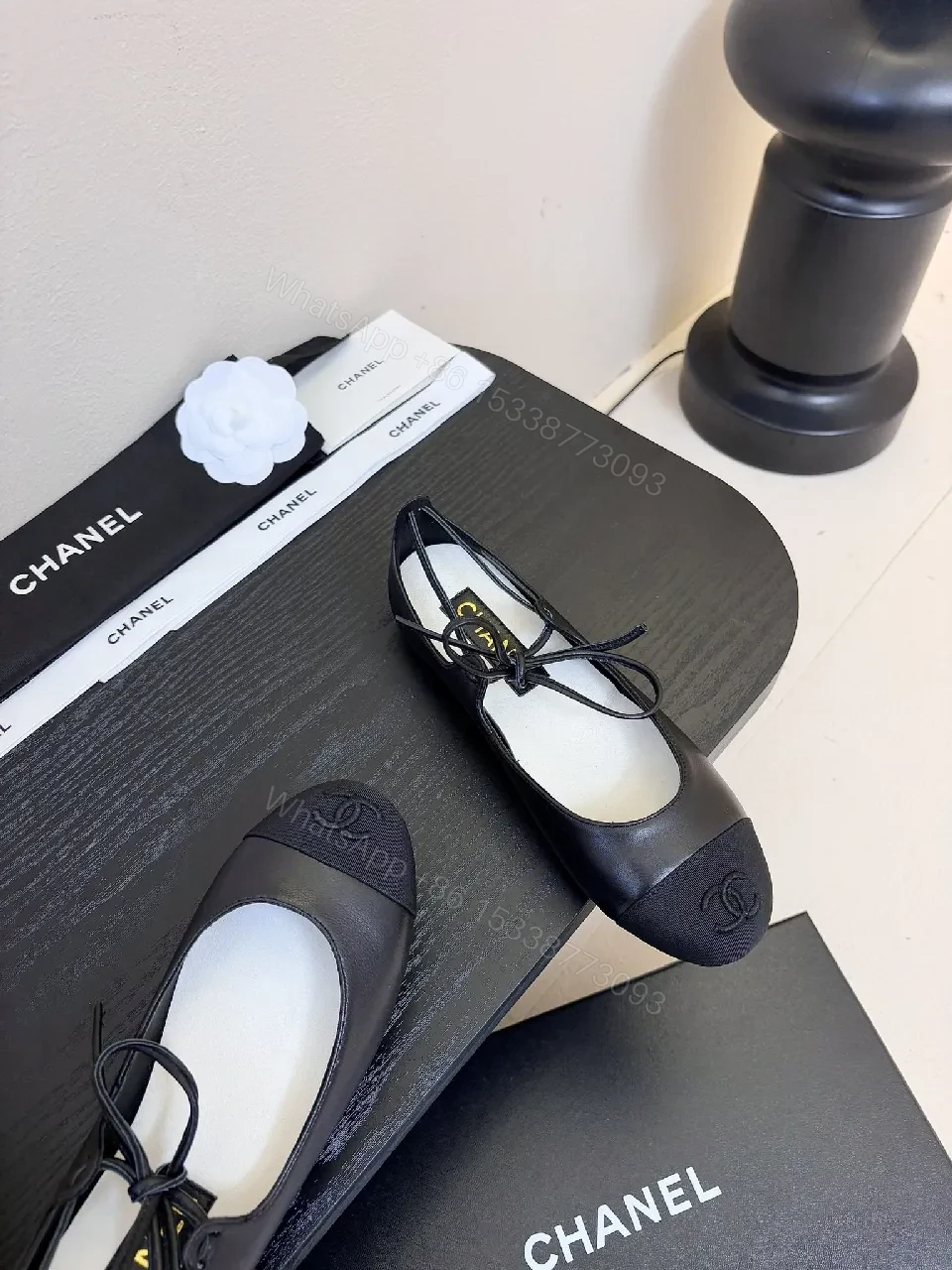 View 8 of Chic Black Leather Ballet Flats with Subtle Logo Detailing