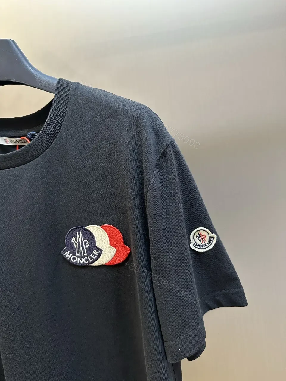 View 10 of Relaxed Luxury Patch Tee - Cotton Blend, Subtle Branding, Casual/Smart-casual