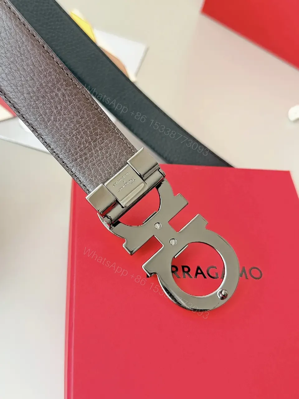View 3 of Silk-Soft Leather Belt with Signature Buckle – Modern Texture