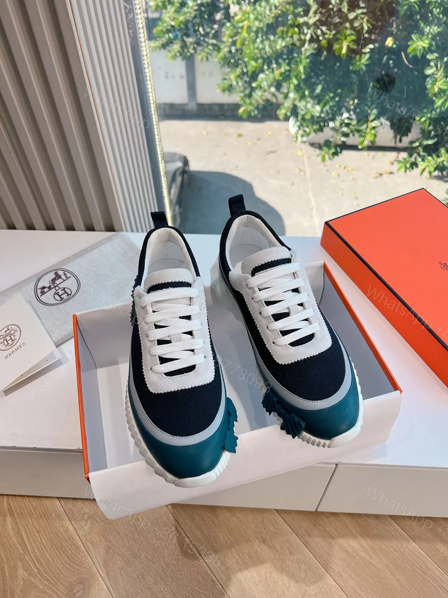 View 3 of Hermes Women Navy Blue White Mesh Sneakers