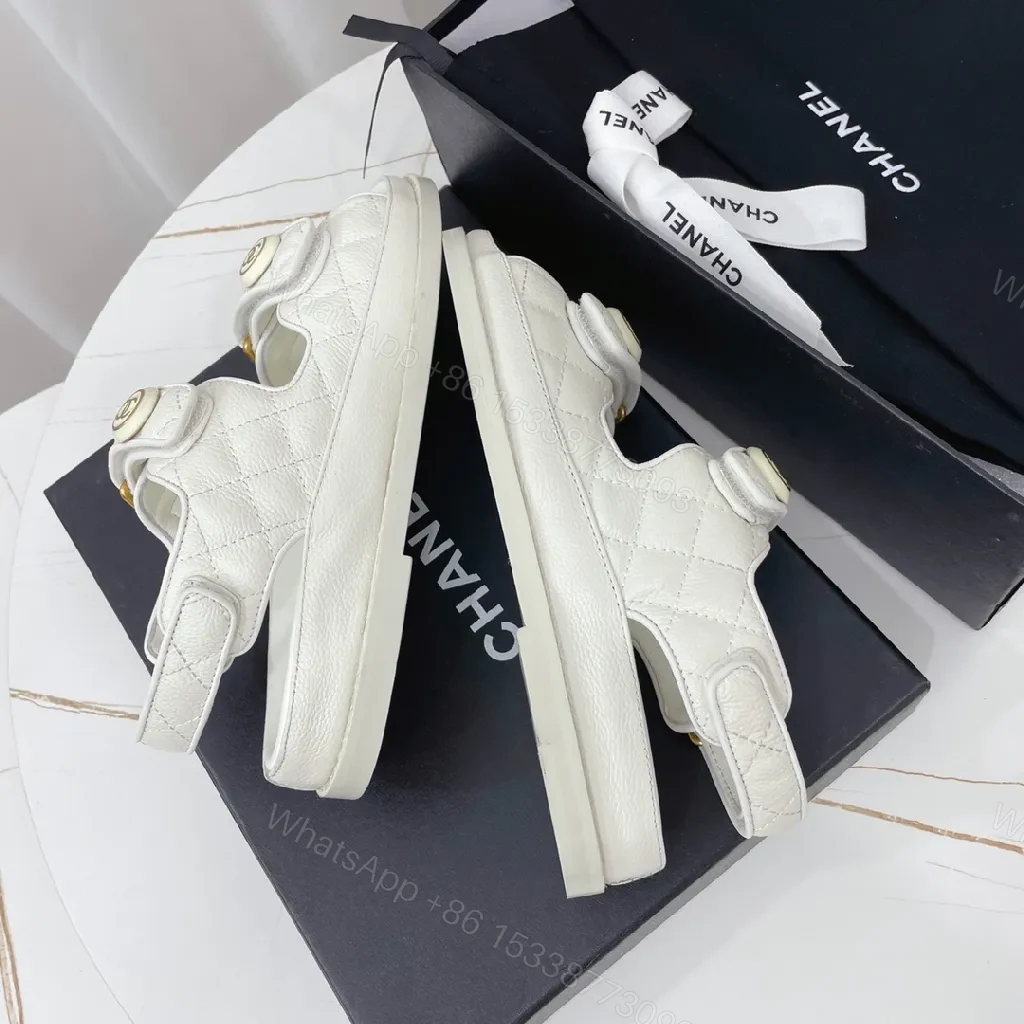 View 3 of White Quilted Sandals with Gold Logo – Luxe Comfort Footwear
