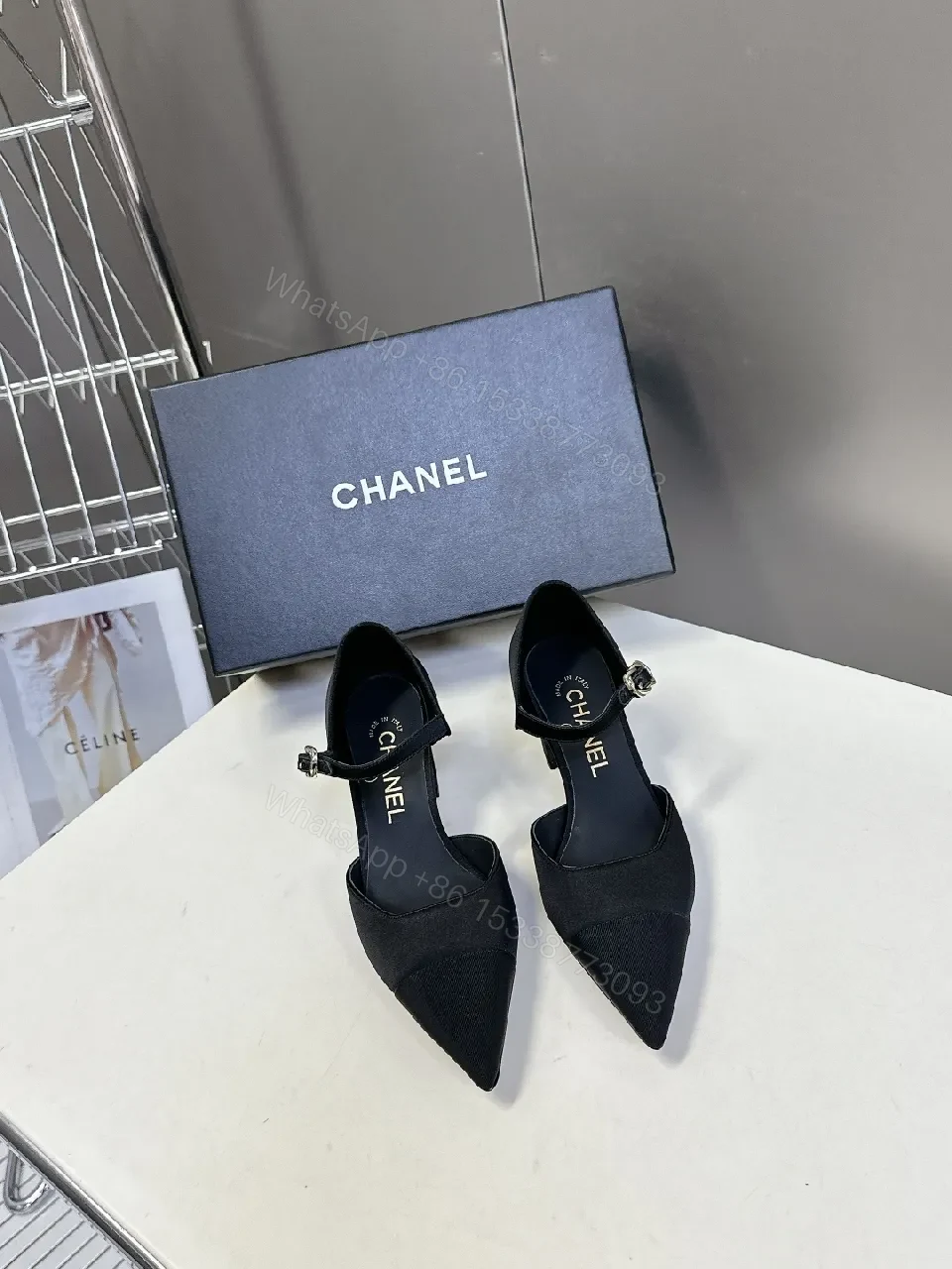 Chic Black Pointed-Toe Heels with Ankle Strap — view 1