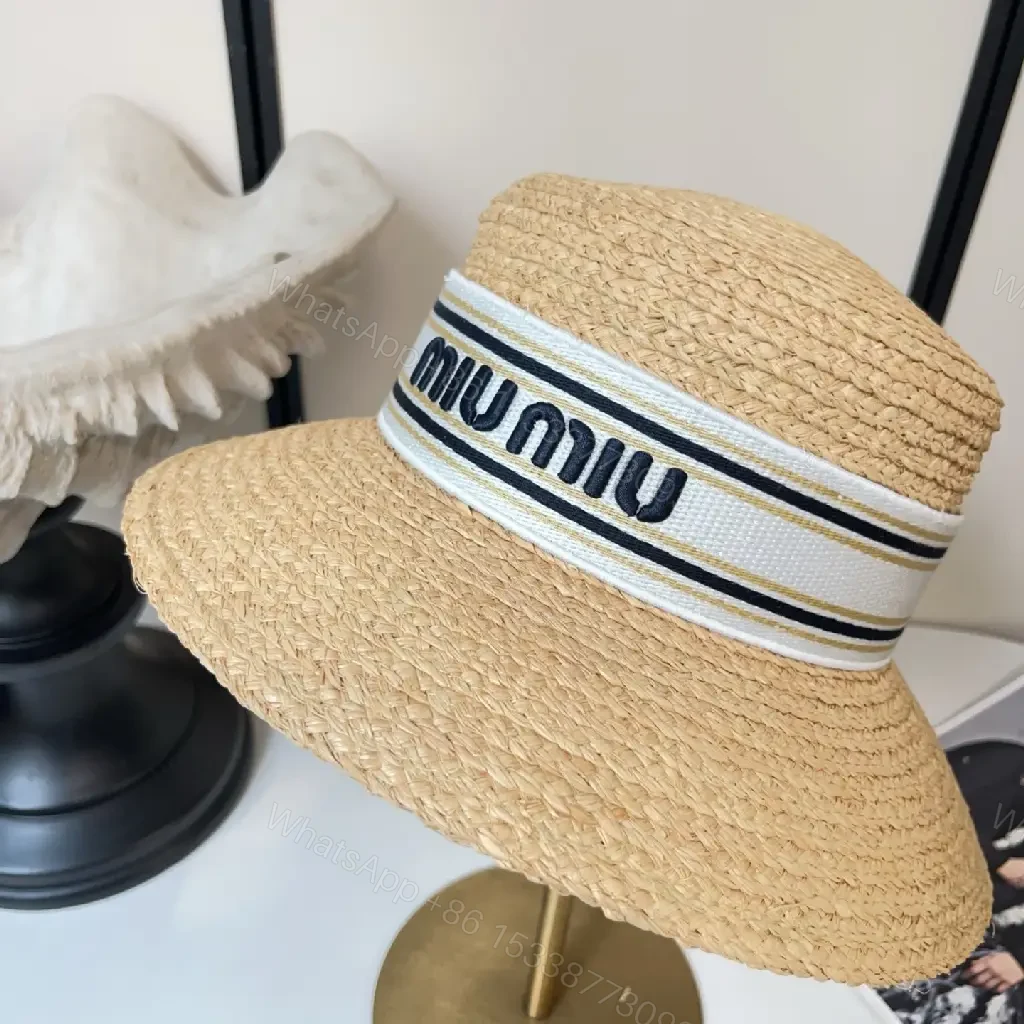 View 2 of Light Tan Straw Hat Wide Brim Flat Crown White Band Blue Stripes MIU MIU Visor Hat
