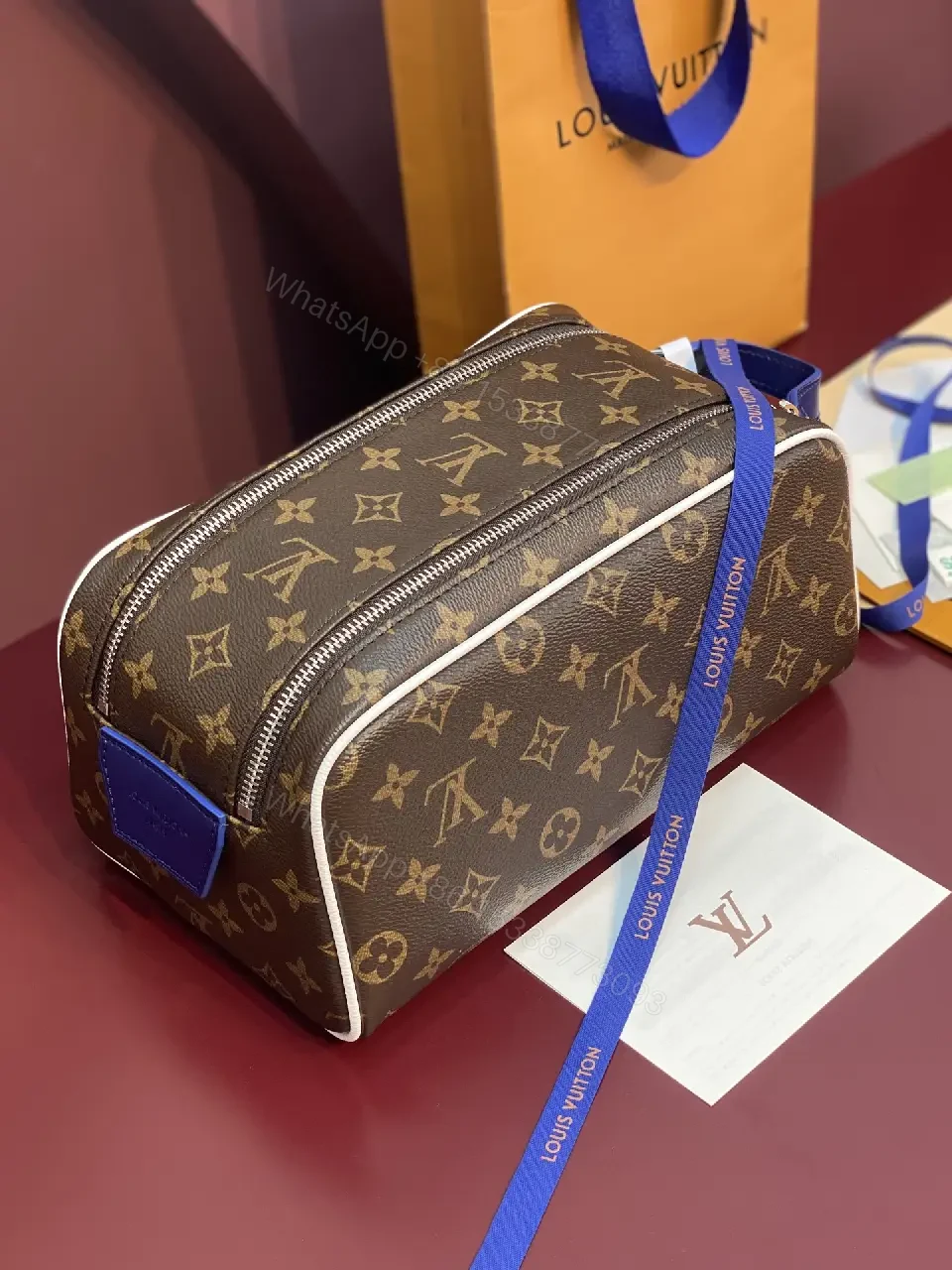 View 6 of Blue Leather Trim Toiletry Bag: Monogram Canvas, LV Zippers, Adjustable Strap