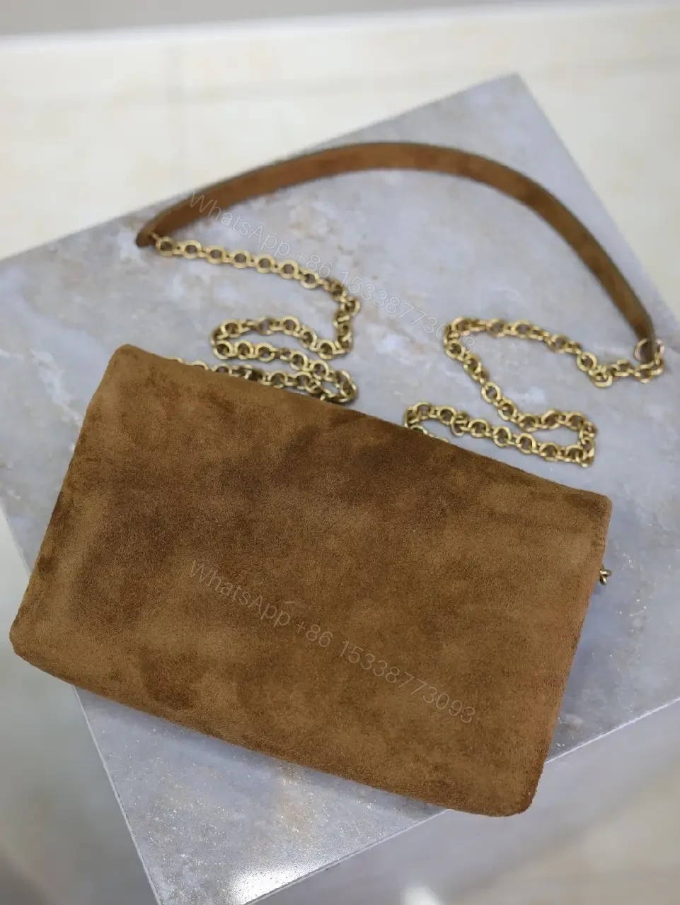 View 10 of Suede Cognac Envelope Bag with Gold Logo Clasp