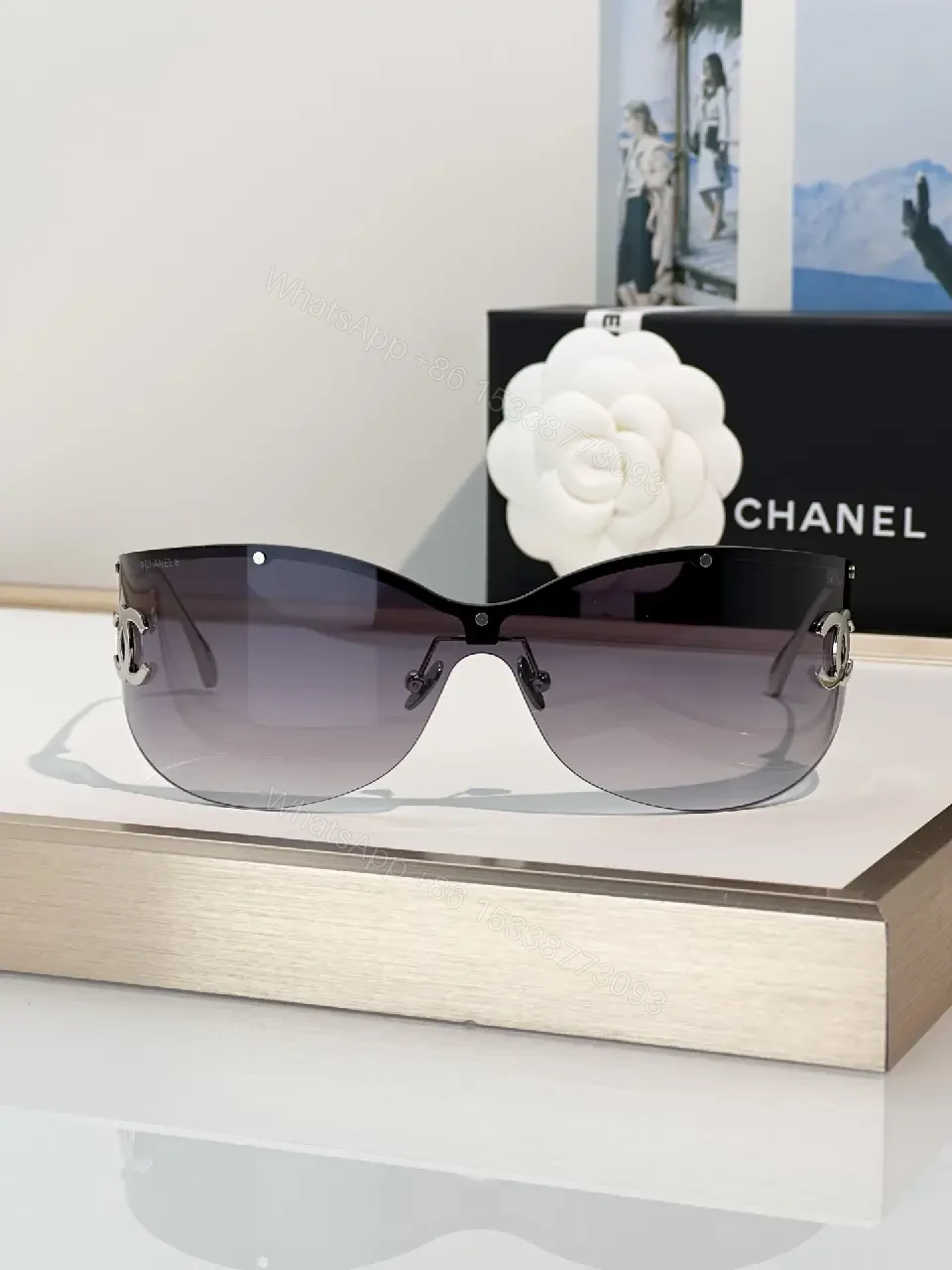 View 7 of Lux Black Gold Shield Sunglasses with Chanel Logo