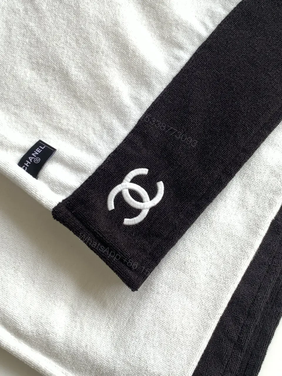 View 6 of White Fabric Handbag with Black Trim Slouchy Style Chanel Logo Tote