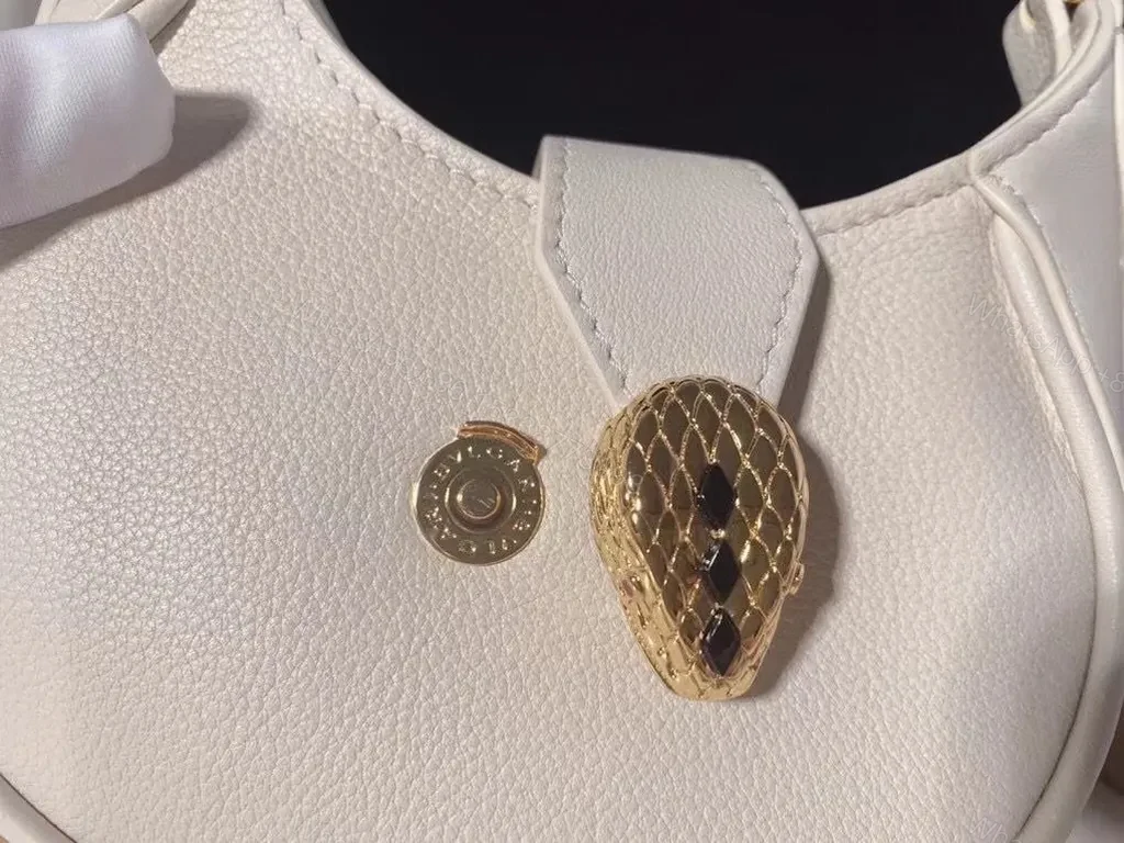 View 6 of Ivory Crescent Mini Bag â€” Day-to-Night Luxury, Sculpted Leather Bag