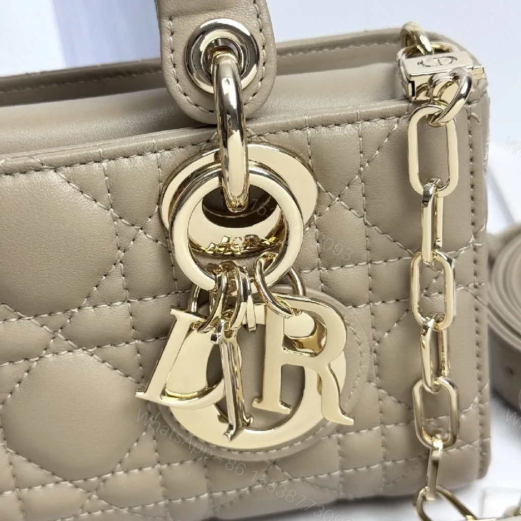 View 2 of Chic Taupe Quilted Mini Bag with Gold Hardware
