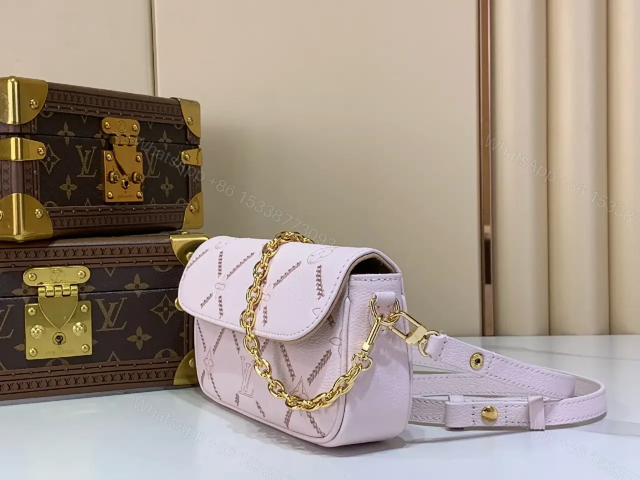 View 4 of Light Pink Pebbled Leather Shoulder Bag with LV Monogram Pattern