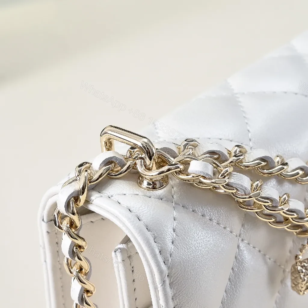 View 5 of Quilted Mini Bag: White Calfskin, Gold Chain, Luxe Silhouette