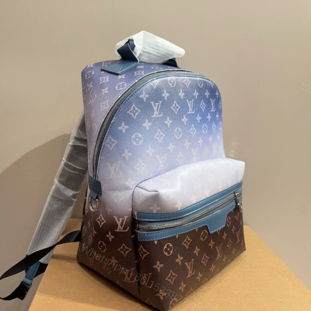 View 3 of Louis Vuitton Discovery Backpack PM Monogram Pigment Blue 38cm M28025