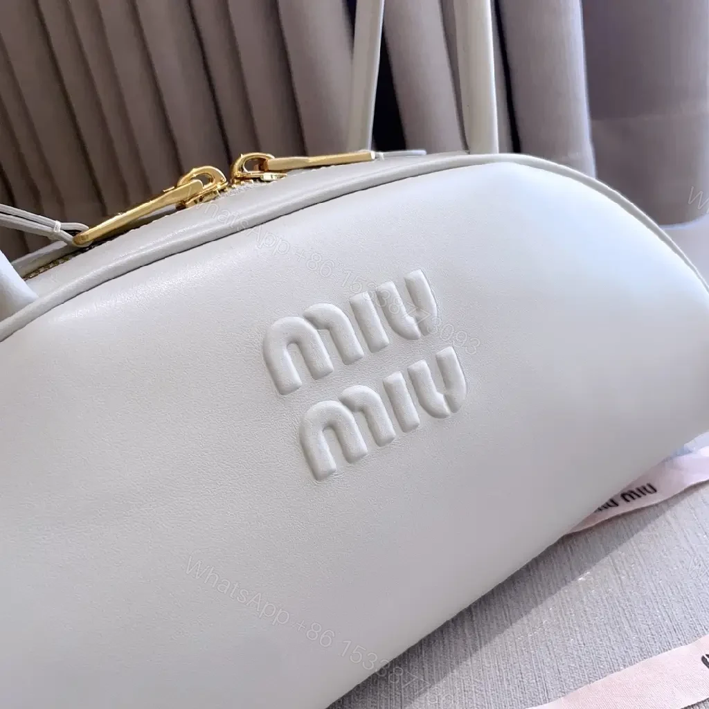 View 10 of Light Leather Dome Bag in Soft Hue, Compact Day-to-Night Carry