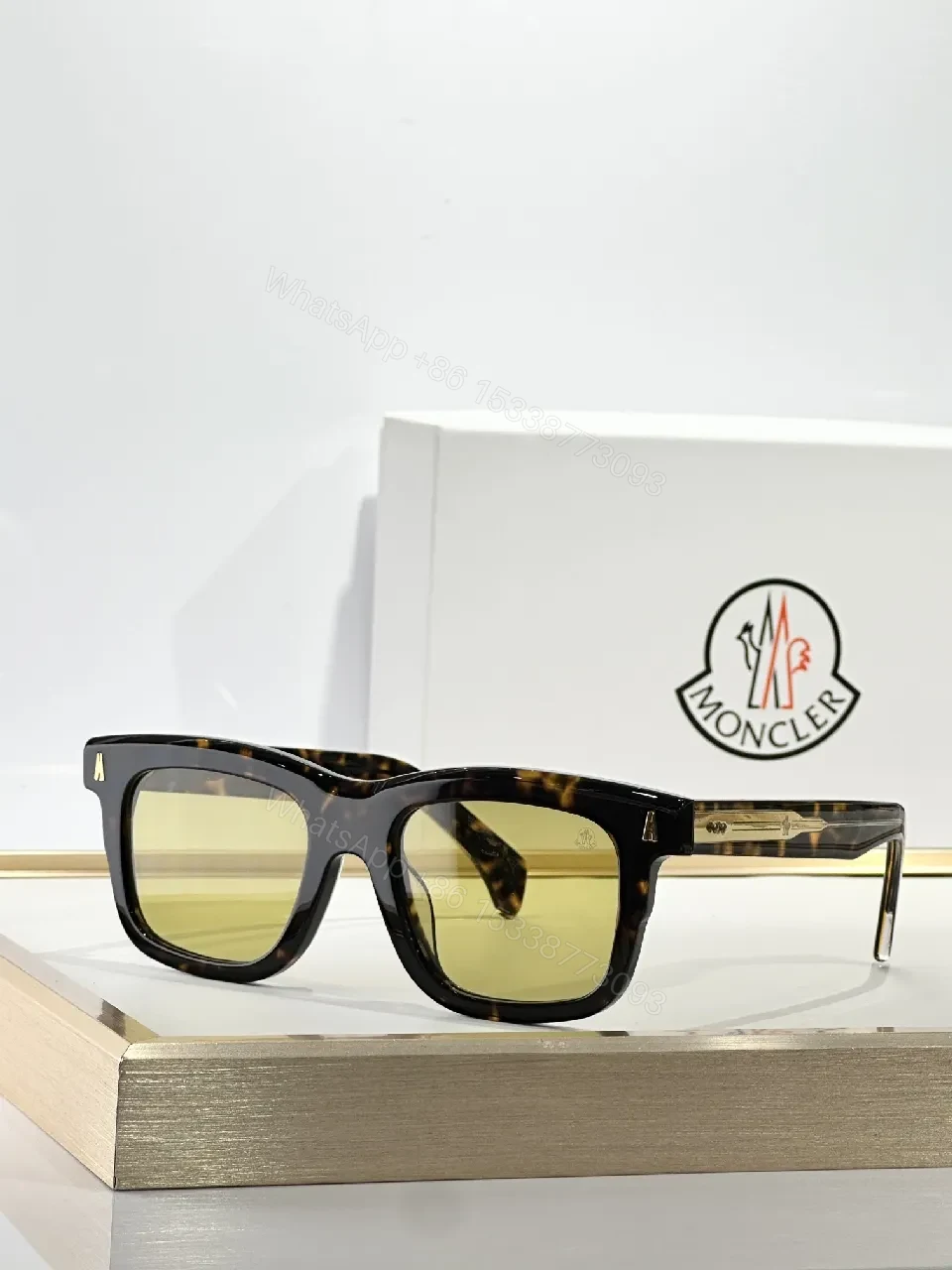 View 5 of Translucent Frame Sunglasses with Amber Lenses and Gold Accents