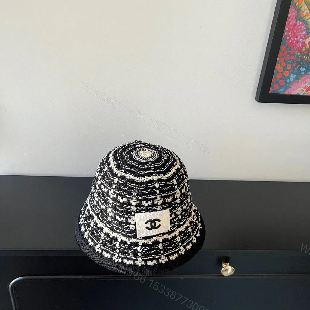 View 8 of Textured Black Bucket Hat | Tweed-Style Knit, Logo Patch, Classic