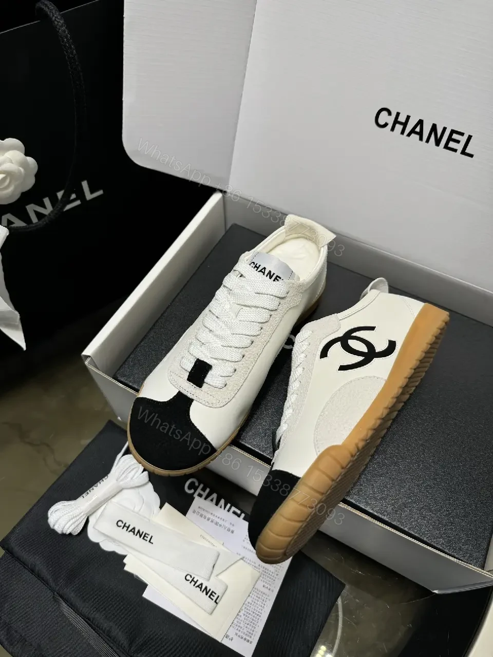 View 8 of Two-Tone White/Black Gum-Soled High-Top Sneakers