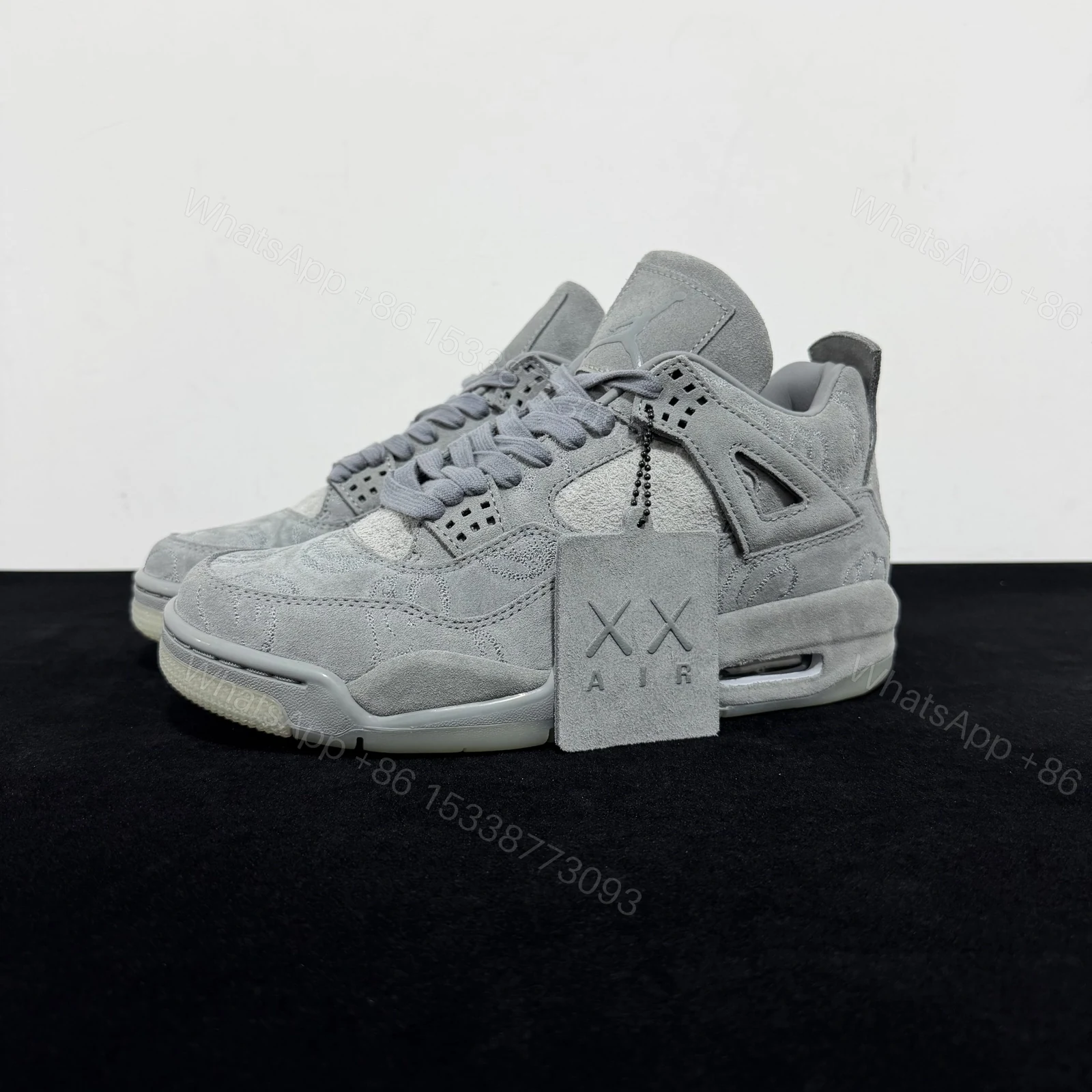View 8 of Air Jordan 4 Retro KAWS Grey Reps