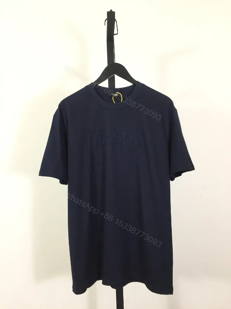 View 6 of Navy Cotton Blend Tee: Subtle Logo, Relaxed Fit, Versatile