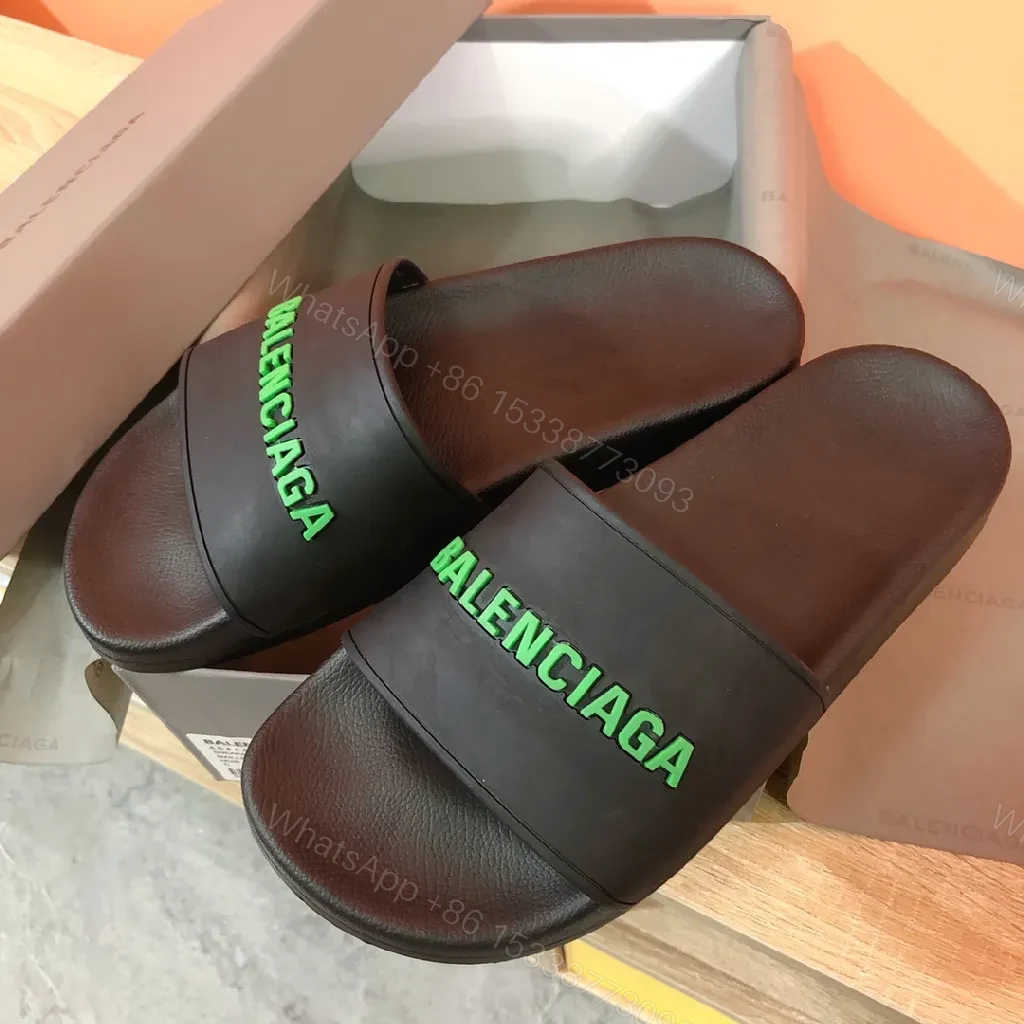 View 4 of Bold Neon Logo Slides: Black Comfort, Statement Style