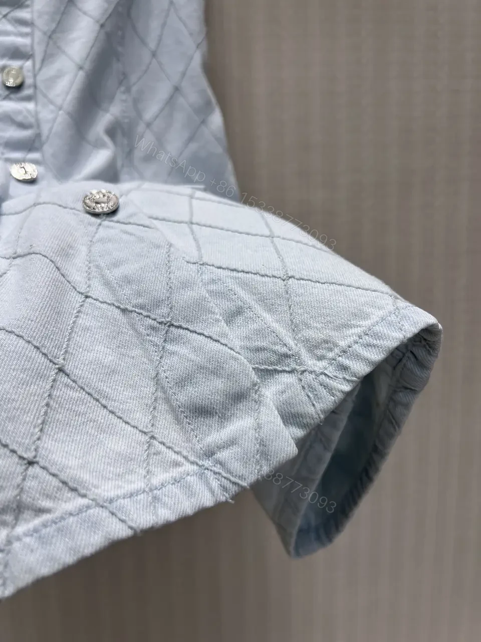 View 5 of Light blue quilted denim dress with diamond pattern, button-front, premium everyday luxury