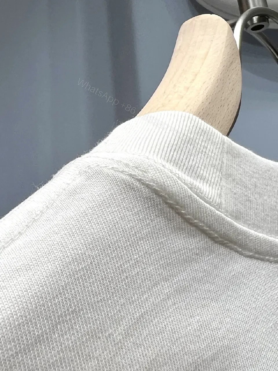 View 7 of White Cotton Tee with Subtle Logo — Everyday Luxe Casual Shirt