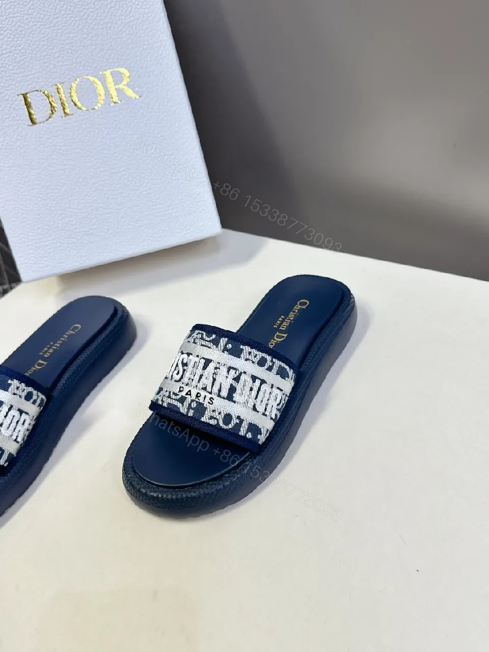 View 5 of Textured Navy Slides: Wide Logo Strap, Elevated Comfort