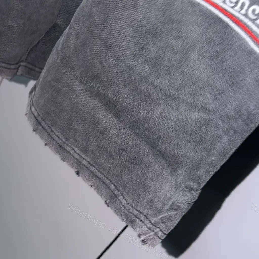 View 8 of Black Denim Shorts with Logo Accent, Balenciaga Style, Key Feature: Drawstring Washable Design