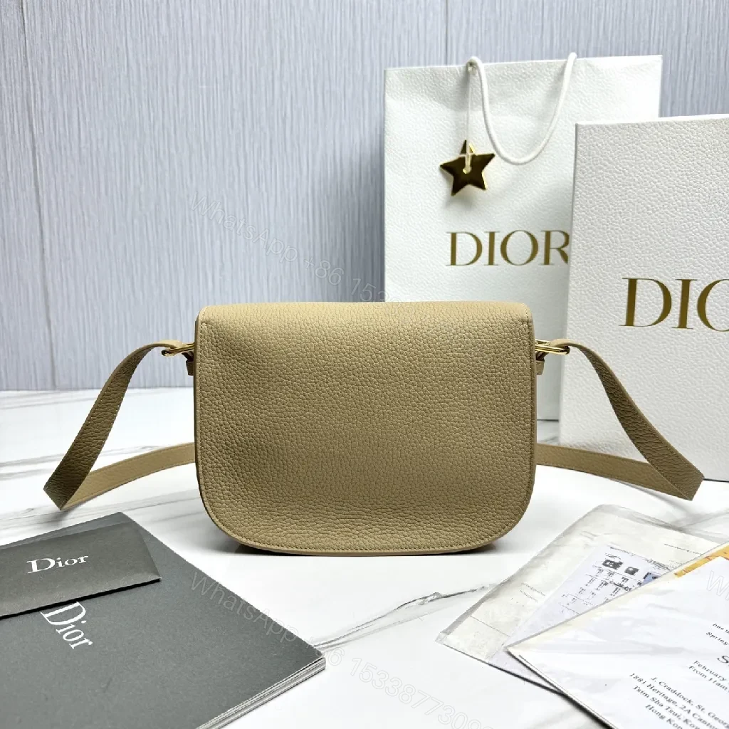 View 4 of Beige Pebbled Leather Saddle Bag — Subtle Texture, Versatile Comfort