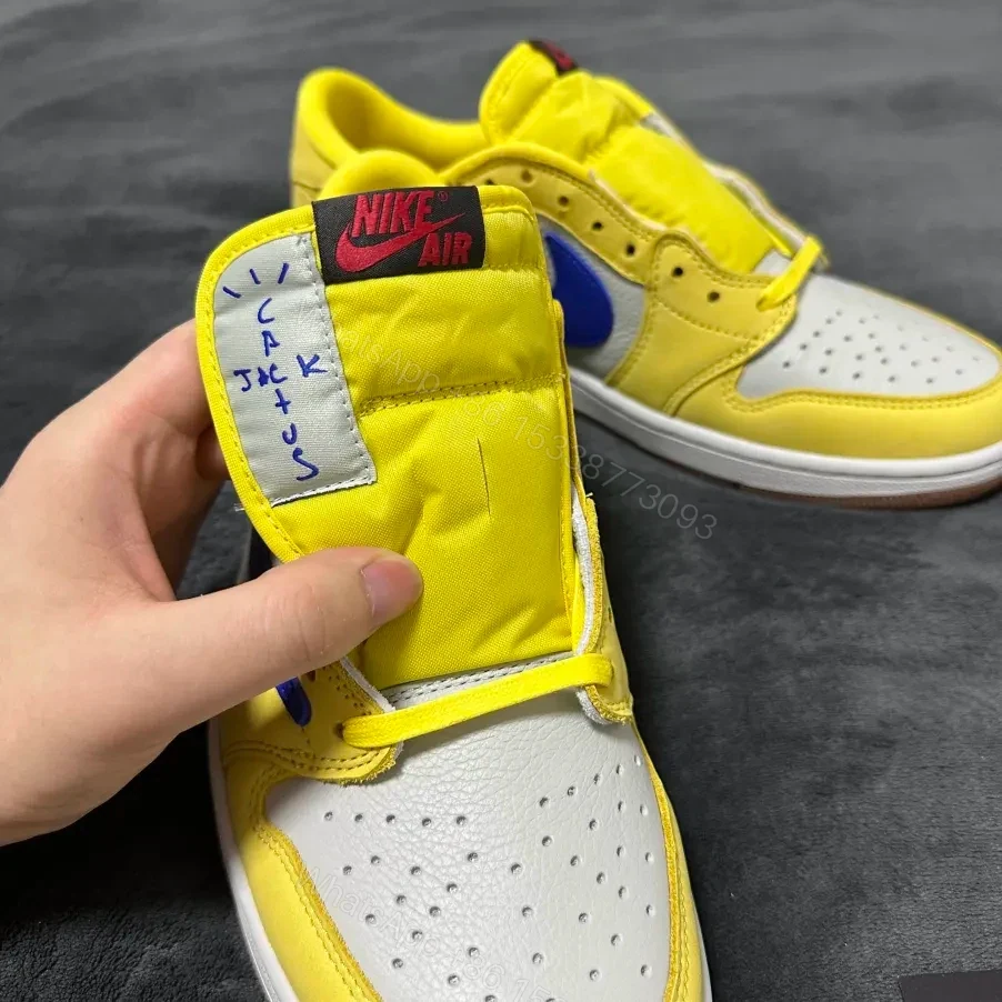 View 9 of Jordan 1 Retro Low OG SP Travis Scott Canary (Women's)