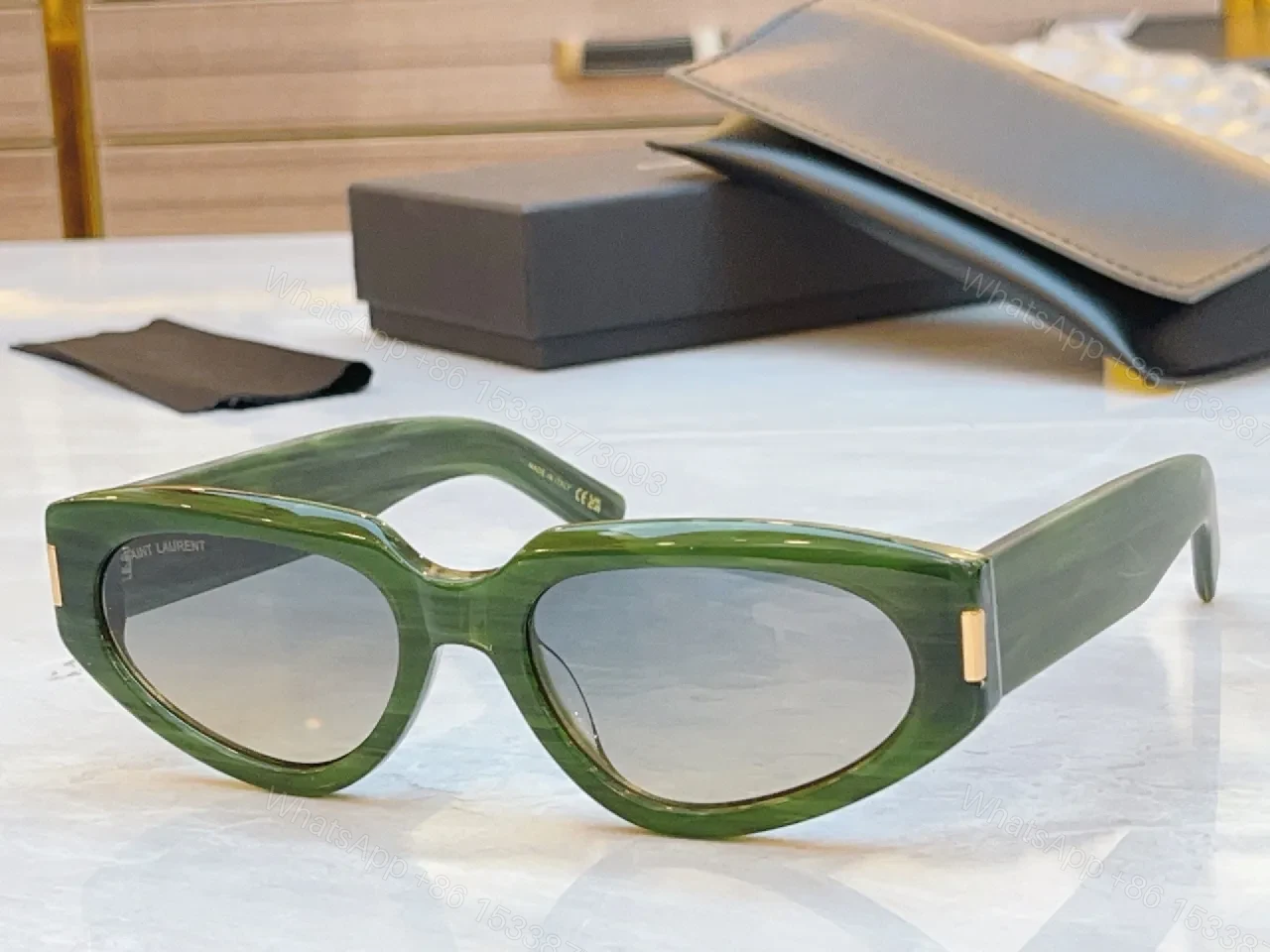 View 4 of Tortoiseshell Cat-Eye Sunglasses with Gold Hardware, UV400 Lens
