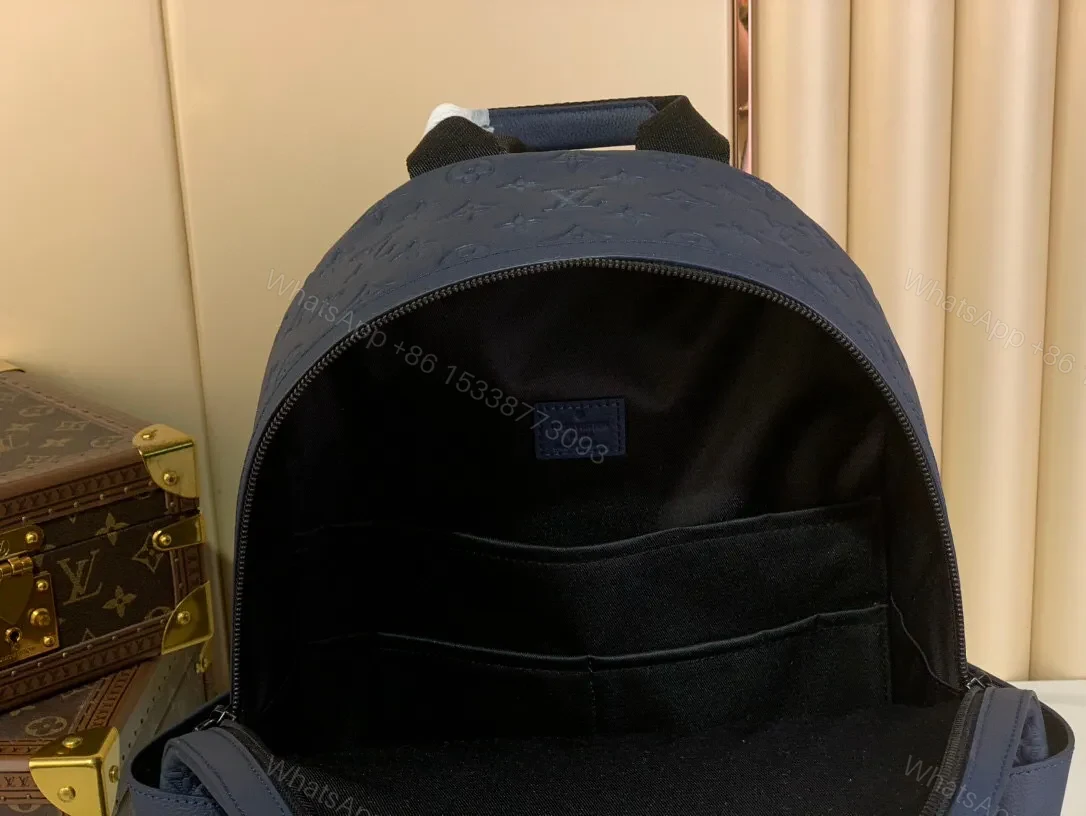 View 4 of Compact Monogram Backpack: Textured Luxury, Everyday-Ready