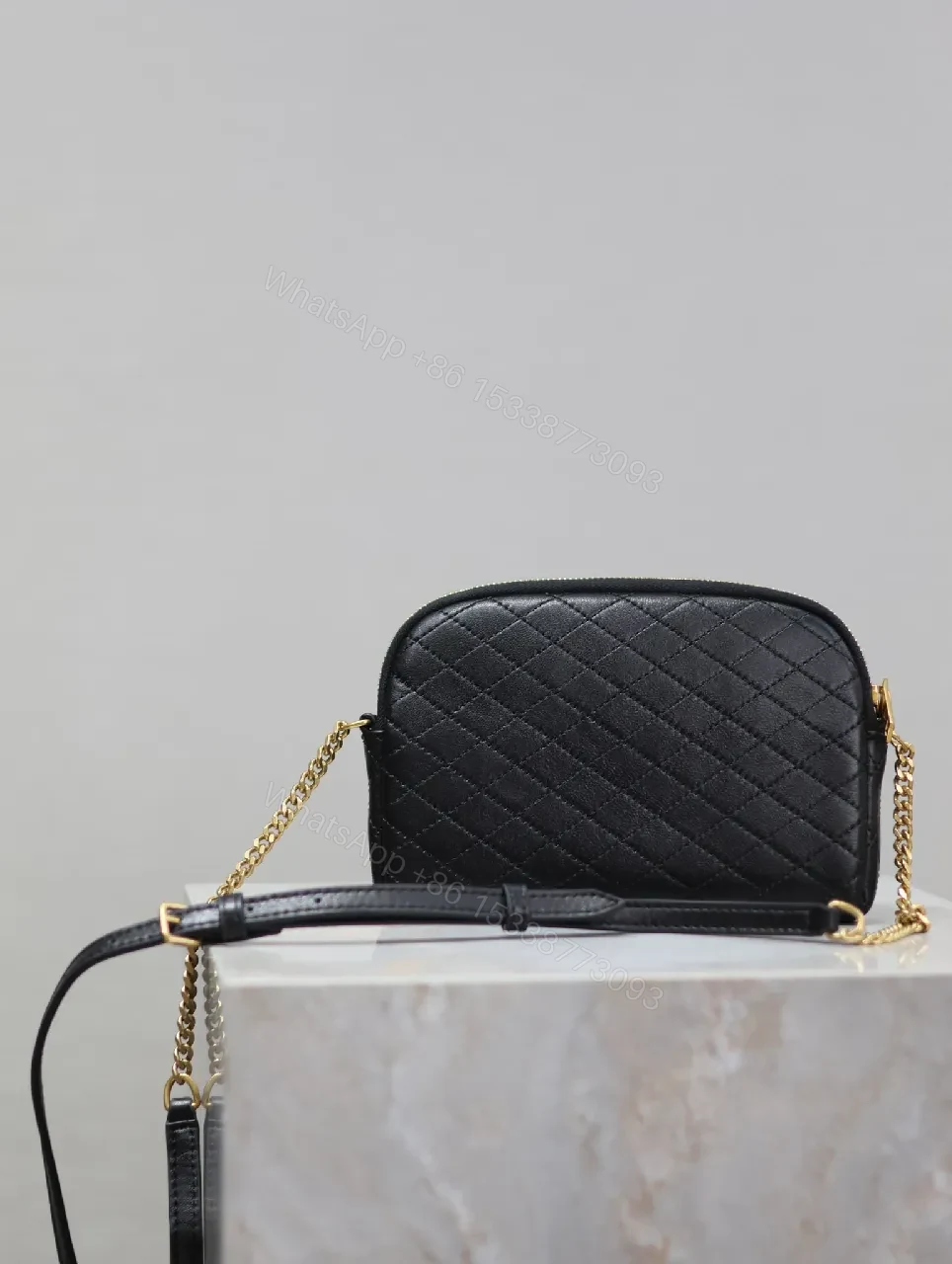 View 5 of Quilted Crossbody Bag with Gold Emblem, Compact Style