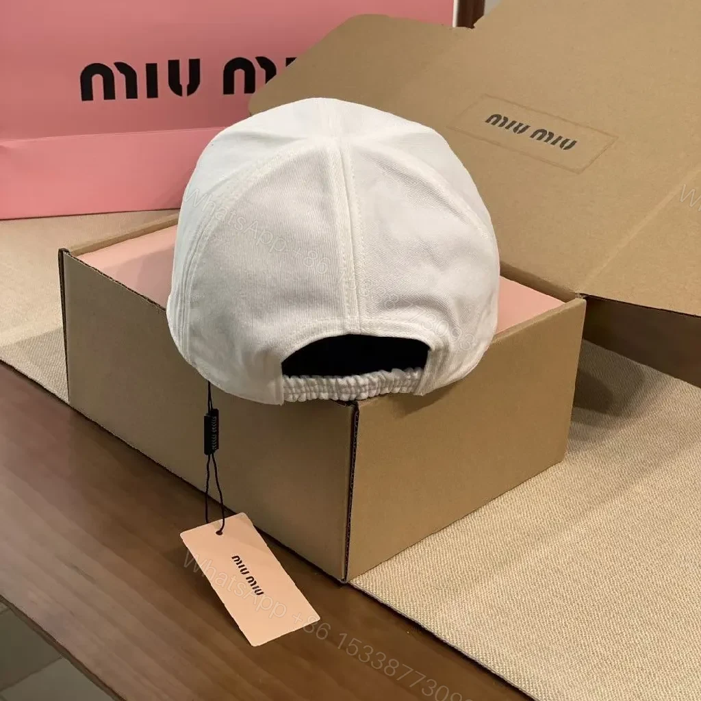 View 9 of White Cotton Cap | Structured Six-Panel, Logo Detail, Adjustable Fit