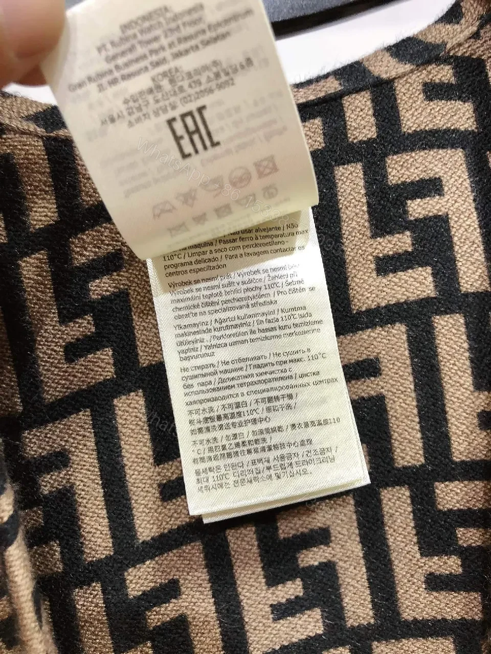 View 2 of Two-Tone Knit Poncho: Luxe Pattern & Soft Fringe