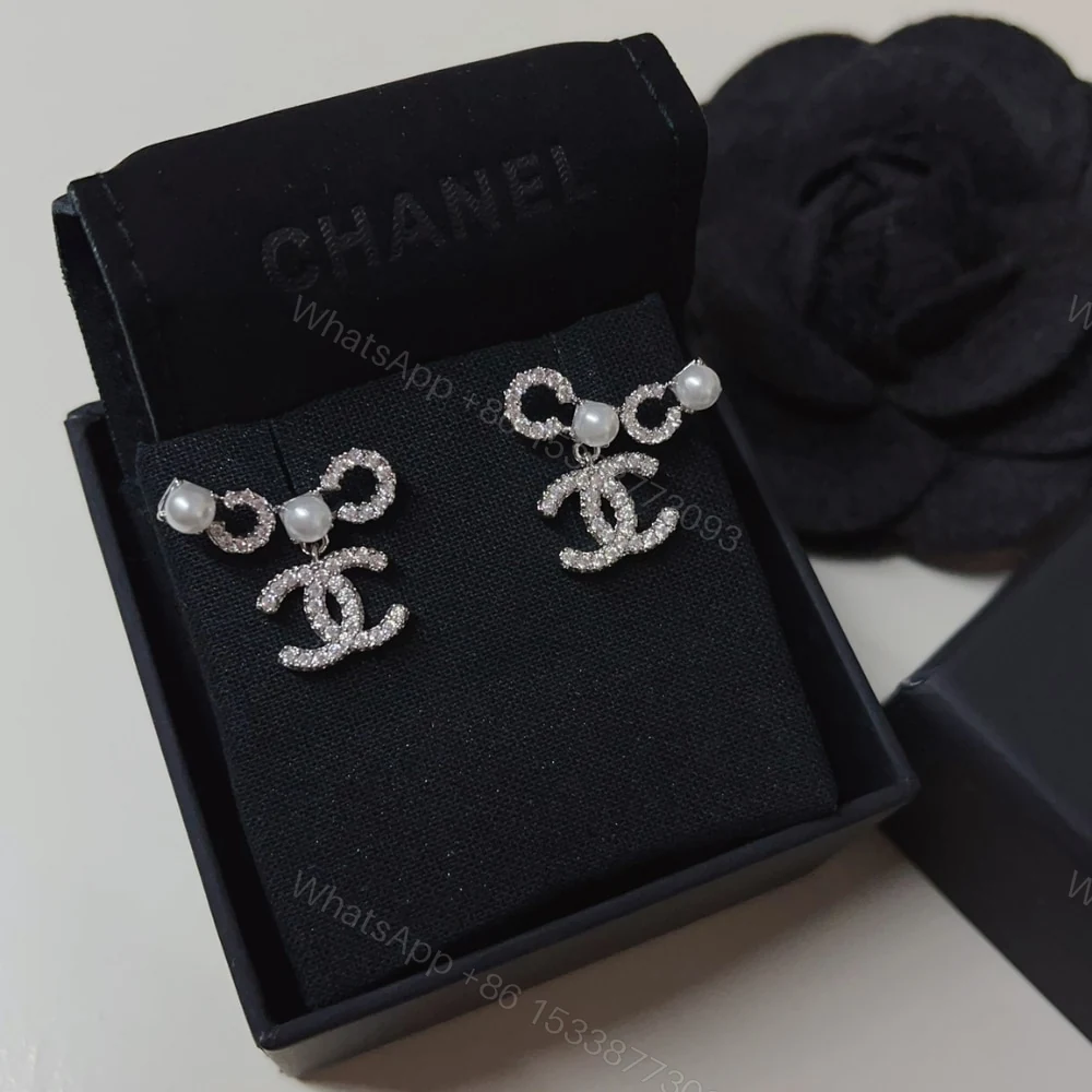 View 2 of CHANEL EARINGS PEARLY WHITE AND CRYSTAL SILVER ABF732 B20573 U0937