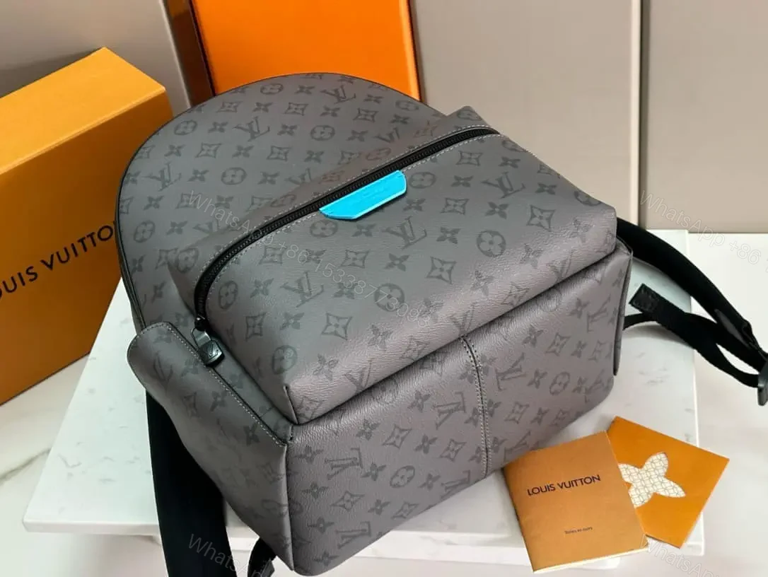 View 4 of Louis Vuitton Discovery Backpack PM